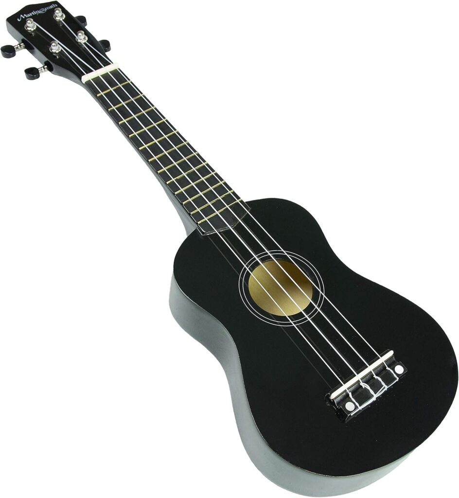A black ukulele is shown - a string instrument with a wide base and pins at the top to adjust the strings.