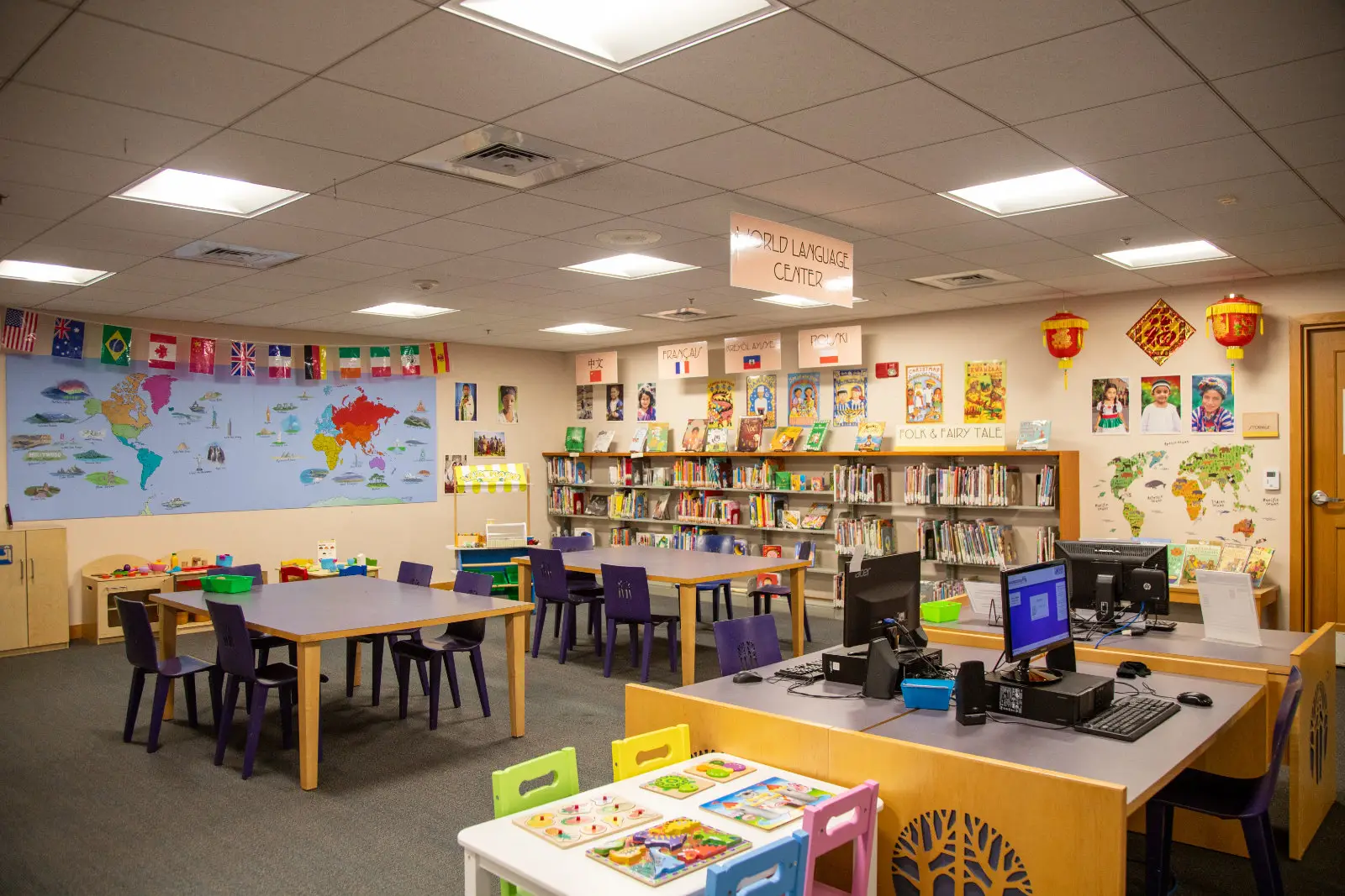 Children and families gathered for a library activity